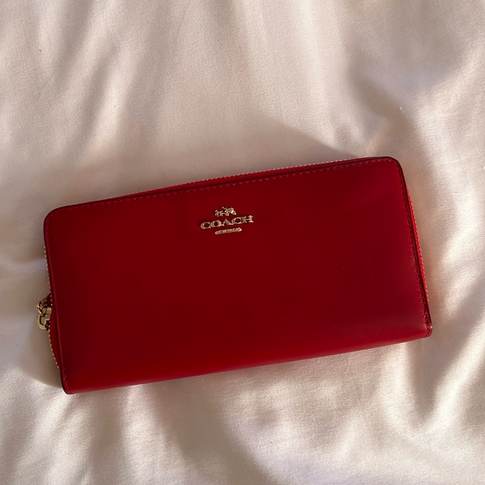Red leather accordion zip wallet